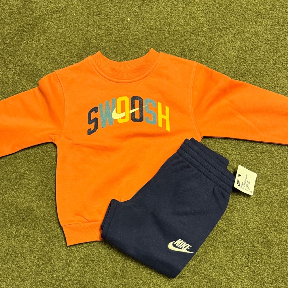 Nike Vibrant Orange Sweatshirt and Dark Blue Joggers